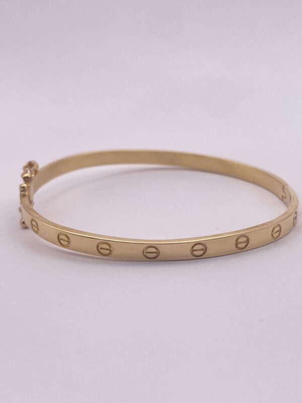 Brazalete tipo aro en oro amarillo - talla 16 cms