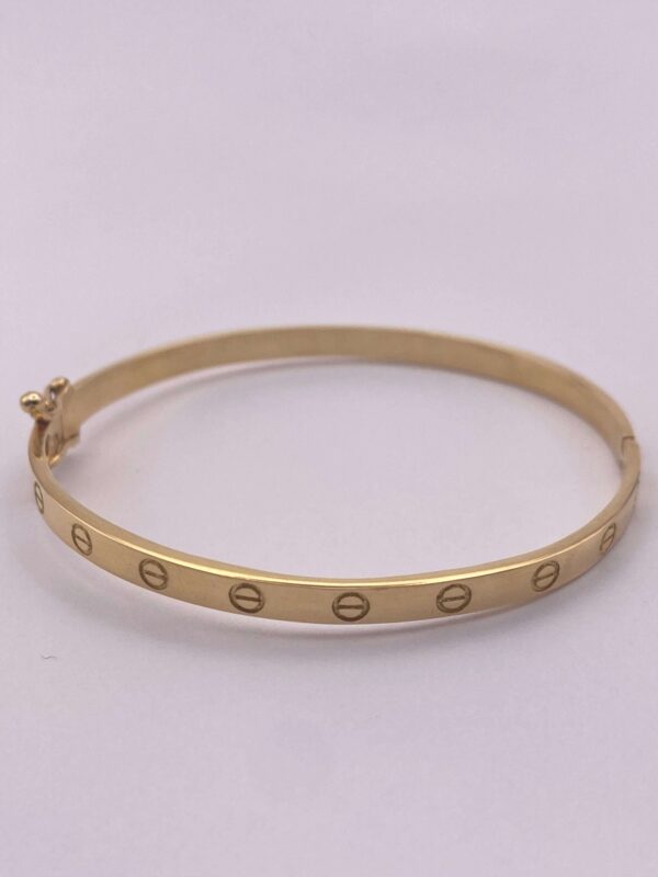 Brazalete tipo aro en oro amarillo - talla 16 cms