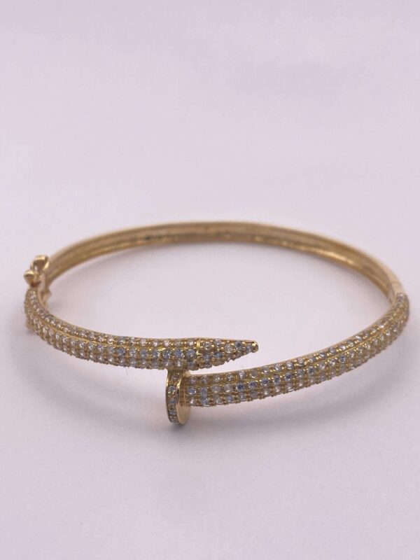 Brazalete tipo aro en oro amarillo - talla 17 cms