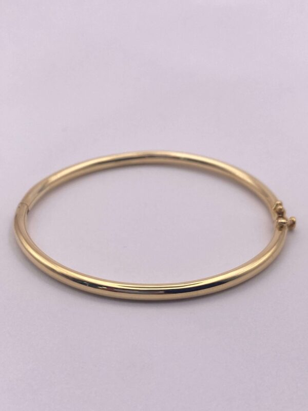 Brazalete tipo aro en oro - talla 16 cms