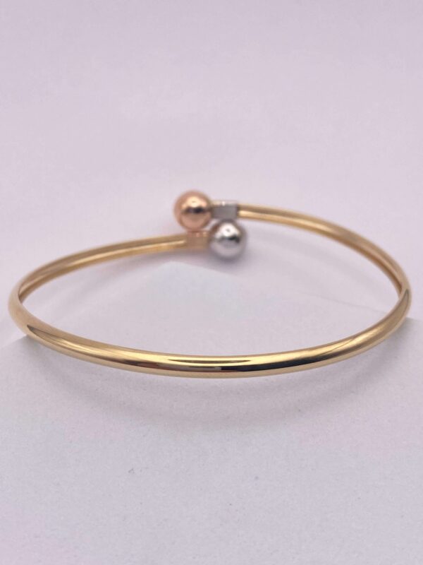 Brazalete tipo aro en oro - talla 17 cms