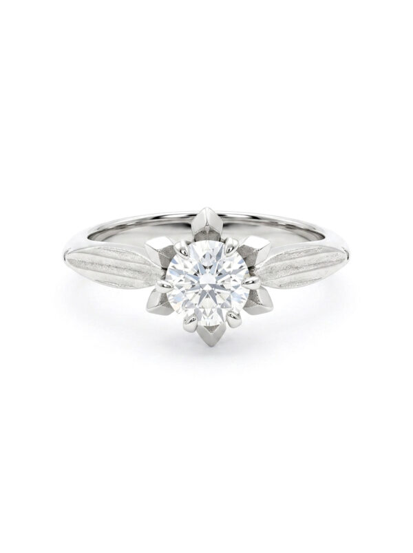 H155 ANILLO FLOR CON DIAMANTE EN ORO BLANCO