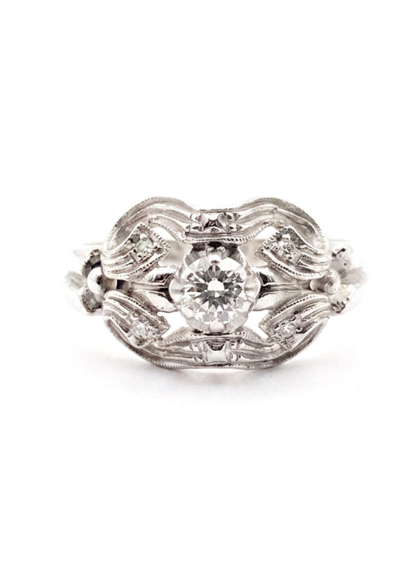 H132 ANILLO EN ORO BLANCO CON DIAMANTES