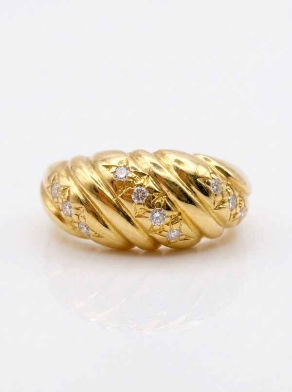 S649 ANILLO CON DIAMANTES EN ORO 18 KILATES