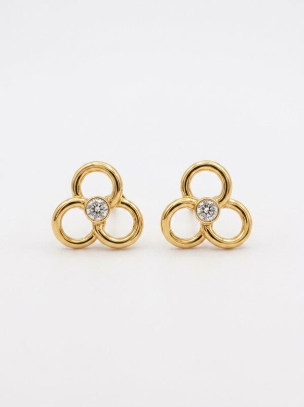 TOP026 TOPOS FLOR EN ORO 18 KILATES