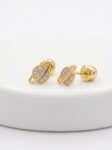 TOP035 TOPOS SATURNO EN ORO 18 KILATES