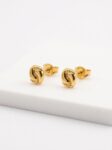 TOP053 TOPO PIES EN ORO 18 KILATES